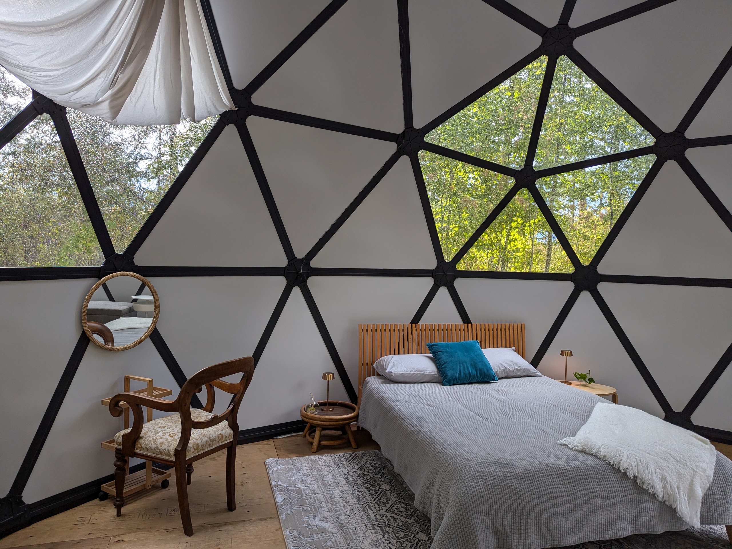 Queen sized bed inside the dome